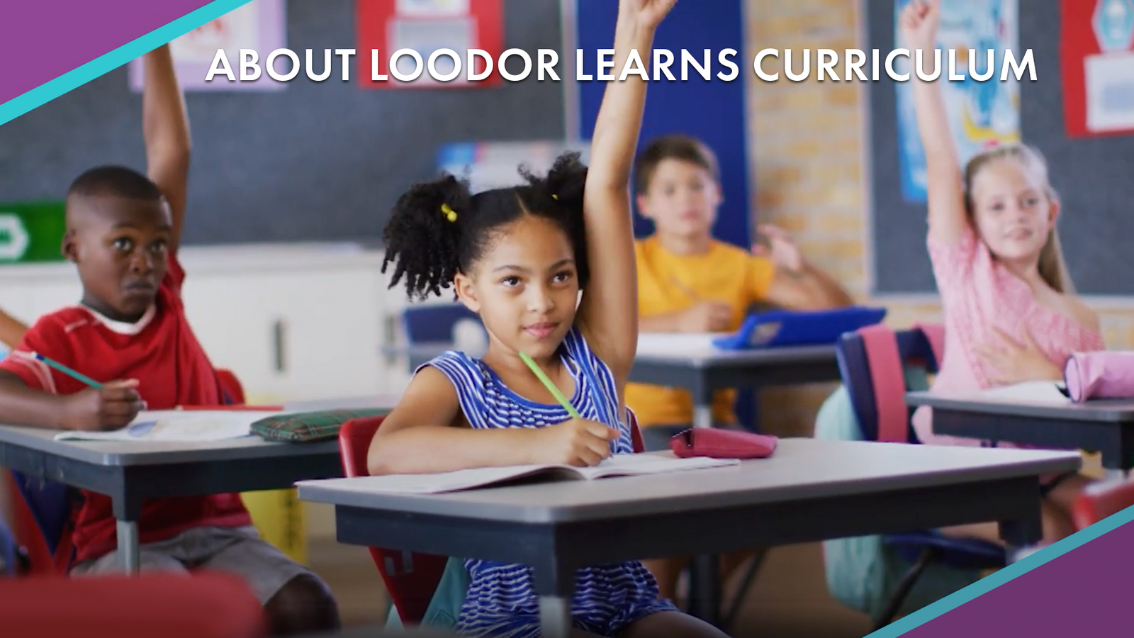 Children in a classroom with one girl raising her hand.